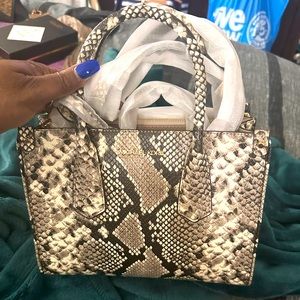 Brand new authentic Michael Kors maple SM embossed satchel